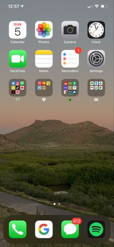 an image of the home screen of an iphone with icons on it, including two different screens