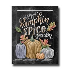 a chalkboard sign that says happy pumpkin spice season with fall leaves and gourds