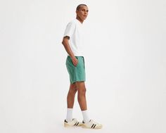 We took our XX Chinos and reinvented them as a pair of modern, roomy shorts. These XX Chino Easy Shorts feature an elasticized waist and keep you casually put together without looking like you tried too hard. A pair of modern, relaxed shorts Cut with extra room in the seat and thigh With an elasticized waistband and external drawstring Crafted with a blend of cotton and nylon Features a 6-inch inseam Cotton Relaxed Fit Swim Trunks For Athleisure, Modern Relaxed Fit Shorts, Relaxed Fit Green Cotton Swim Trunks, Green Relaxed Fit Cotton Swim Trunks, Casual Relaxed Fit Swim Trunks, Modern Relaxed Fit Shorts For Summer, Green Cotton Relaxed Fit Swim Trunks, Modern Relaxed Fit Summer Shorts, Green Cotton Swim Trunks With Relaxed Fit