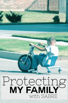 a young boy sitting on top of a scooter with the words protecting my family