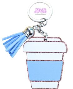 a blue and white cup keychain with tassels on the bottom,