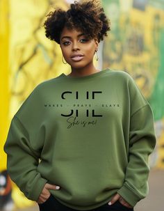 Express your inner power and confidence with this standout collection that goes beyond just clothing--it's a statement of self-love, resilience, and determination. Elevate your wardrobe and empower your spirit with the "Wake, Pray, Slay - She is Me" collection today. Because every day is an opportunity to conquer, and every woman is a force to be reckoned with. Perfect gift for other woman. Sweatshirt * 50% cotton 50% polyester *  Double needle stitched throughout * 1x1 ribbed collar, cuffs and