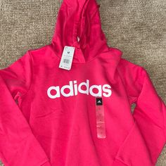 Bright Pink In Color. Size Medium Spring Sports Sweatshirt With Logo Print, Spring Sportswear Top With Logo Print, Spring Letter Print Sportswear Sweatshirt, Adidas Sportswear Tops With Letter Print, Adidas Casual Sweatshirt For Spring, Adidas Casual Spring Sweatshirt, Casual Adidas Sweatshirt For Spring, Adidas Tops With Letter Print For Sports Season, Spring Adidas Sweatshirt For Sports