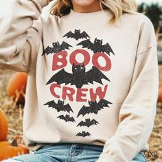 Get ready for spooky season with our Boo Halloween Sweatshirt! Perfect for bat lovers, this unisex crewneck sweatshirt combines comfort and style, making it ideal for Halloween parties or cozy nights in. Crafted from soft, high-quality fabric, it features a fun design that celebrates the spirit of Halloween. Whether you're trick-or-treating or just enjoying the festive vibes, this sweatshirt is a must-have for your autumn wardrobe. Treat yourself or gift it to a friend and embrace the Halloween Halloween Sweater Ideas, Halloween Crew Neck Top With Graphic Print, Sweater Ideas, Group Events, Autumn Wardrobe, Halloween Tshirt, Halloween Sweater, Halloween Parties, Halloween Fashion