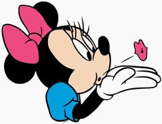 an image of minnie mouse blowing on a flower