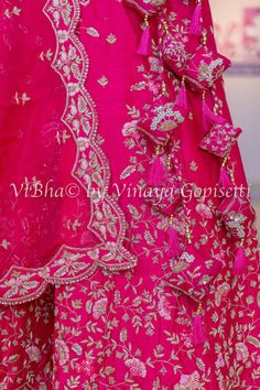 Elevate your special occasion look with our Dark Pink Raw Silk Embroidered Lehenga Set. Crafted with intricate Resham and Zardosi embroidery and finished with scalloped borders, it exudes luxury and elegance. The set includes a Dark Pink Raw Silk Lehenga Blouse and a Net Dupatta, making it a perfect choice for the brides.. Embroidered Sets For Wedding And Diwali, Pink Embroidered Silk Thread Sharara, Embroidered Silk Thread Lehenga For Wedding, Embroidered Dola Silk Sets For Wedding, Wedding Sets In Art Silk With Floral Embroidery, Wedding Sets In Dola Silk With Embroidery, Wedding Sets With Embroidery In Dola Silk, Pink Silk Thread Wedding Sets, Wedding Silk Thread Embroidered Sets