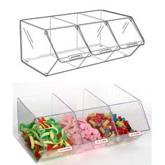 two clear plastic bins with different types of candy in them and the bottom one is empty