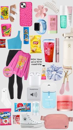 an assortment of various items that are on the white surface, including clothing, toiletries and cell phones