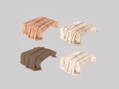 four different types of scarves on a gray background