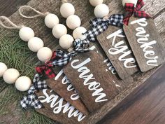 some wood signs are sitting on the ground next to eggs and other items that have been placed