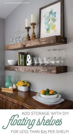 two wooden shelves with wine glasses and candles