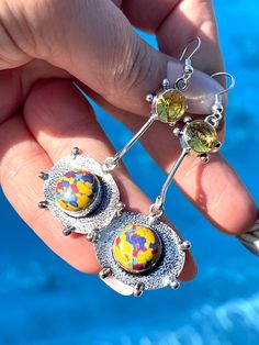 "One-of-a-kind, natural mosaic jasper and Citrine, Earrings, set in oxidized, 925 sterling silver plated over copper bezel setting, with solid sterling silver ear wire closures. Total drop length/width: 2.65\" x 1.15\" inches. Jasper stones: 12mm, Round. Citrines: 9mm, round, faceted." Unique Multicolor Gemstone Earrings, Artisan Multicolor Earrings With Natural Stones, Multicolor Artisan Earrings With Natural Stones, Unique Multi-stone Round Earrings, Artistic Yellow Jewelry With Matching Earrings, Yellow Fusion Earrings For Gifts, Yellow Fusion Style Earrings For Gift, Crystal Hair Pins, Lapis Lazuli Pendant