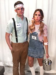 a man and woman dressed up in costumes