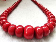 material:natural stone with heat treated coral color quantity:one strand 22inch=57-60pcs size:approx.7X10-17X22mm note:have larger stock and offert wholesale price. Luxury Polished Red Coral Beads, Ruby And Diamond Necklace, Large Necklace, Rice Bead, Orange Coral, Coral Necklace, Coral Jewelry, Turquoise Howlite, Necklace Minimalist