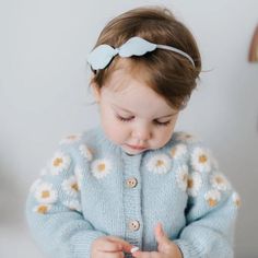 Made from eco-friendly, breathable, and hypoallergenic knit cotton, this cardigan guarantees your little girl's comfort. It can be easily maintained by machine-washing on low or delicate and drying on gentle or low settings, making it the ideal gift for any special occasion.Colors: Light Blue and Pink Cute Blue Sweater For Playtime, Spring Cotton Cardigan For Playtime, Spring Playtime Long Sleeve Cardigan, Spring Long Sleeve Cardigan For Playtime, Playful Blue Sweater For Spring, Cute Spring Cardigan For Playtime, Blue Playful Sweater For Spring, Playful Blue Spring Sweater, Playful Sweater For Spring Playtime