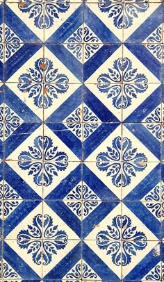 blue and white tiles with an ornate design