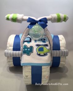 an infant's toy with a pacifier in the handlebars on it