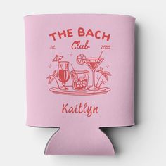 a pink can cooler with the words, the beach club and cocktails on it