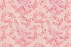 a pink background with lots of butterflies on it