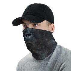 This versatile Neck Gaiter can be used as a face mask, headband, bandana, wristband, balaclava, and neck warmer. * 95% polyester, 5% elastane (fabric composition may vary by 1%) * Fabric weight: 6.19 oz/yd² (210 g/m²) * Breathable fabric * Washable and reusable * Four-way stretch fabric that stretches and recovers on the cross and lengthwise grains * One size * Printed on one side, reverse side is left blank Black Novelty Costume Accessories For Winter, Adjustable Black Costume Accessories For Winter, Novelty Black Costume Accessories For Winter, Black Adjustable Costume Accessories, Adjustable Black Winter Headwrap, Adjustable Black Full Face Mask, Adjustable Full Face Black Mask, Winter Novelty Costume Accessories, Gorilla Face