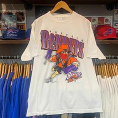 Vintage Nhl 1996 Buffalo Bandits Shirt, Unisex T-Shirt Sweatshirt Hoodie, Vintage Shirt For Men Women, Birthday Gift, Graphic Tees, Fan Gift Reprinted Shirt Made By Gildan Brand 5.3-Ounce, 100% Cotton (99/1 Cotton/Poly (Ash) & 90/10 Cotton/Poly (Sport Grey) Heavyweight Classic Unisex Tee Taped Neck And Shoulders; Tearaway Label Decoration Type: Digital Print Vintage Sports Tshirt, Vintage Sports Shirts, Vintage Sports Tees, Buffalo Bandits, Vintage College Shirts, Christian Book, College Apparel, Women Birthday, Sports Sweatshirts