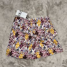 Multi Color Shorts Multicolor Printed Bottoms For Summer, Yellow Stretch Shorts For Vacation, Multicolor Stretch Floral Print Shorts, Stretch Multicolor Floral Print Shorts, Stretch Yellow Shorts For Beach Season, Printed Shorts For A Spring Day Out, Chic Multicolor Shorts For Spring, Yellow Bottoms With Floral Print For Spring, Spring Printed Short Bottoms