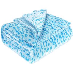 the blue leopard print blanket is folded up