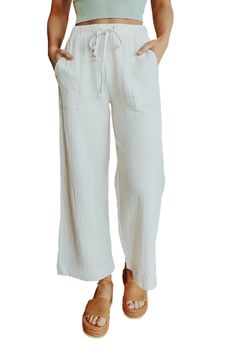 White Drawstring Waist Crinkled Wide Leg Pants Casual Wrinkled Wide Leg Bottoms, Spring Cotton Bottoms With Crinkle Texture, Summer Loungewear Bottoms With Crinkle Texture, Summer Loungewear Pants With Crinkle Texture, Summer Wide Leg Crinkle Texture Pants, Casual Bottoms With Crinkle Texture For Spring, Casual Summer Pants With Crinkle Texture, Summer Wide Leg Pants With Crinkle Texture, Summer Wide Leg Bottoms With Crinkle Texture