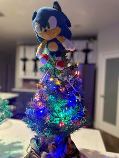 the sonic christmas tree has been decorated with colorful lights and decorations, including an ornament