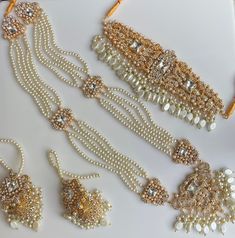 A must have for the upcoming wedding season! This bridal set is a unique blend of royal and modern with its pastel hues and gold plating. The set is gorgeous with pearls and is a full bridal piece but can be worn separately for a lighter and simple look. Set includes: mala , earrings, maang tikka , passa, choker In stock and ready to ship‰Û? I have a separate listing for the champagne gold color Nikkah Jewellery, Full Bridal Jewellery Set, Champagne Gold Color, Wedding Jewelry Sets Bridal Jewellery, Bridal Jewelry Sets Brides, Feminine Shoes, Rani Haar, Perhiasan India, Indian Bridal Jewelry Sets