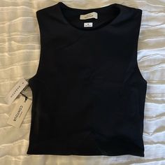 Aritzia Contour Muscle Tank In Black In Size Xs. Never Worn New With Tags Fitted Crew Neck Tank Top For Night Out, Black Fitted Crop Top Tank, Black Fitted Tank Top With Crew Neck, Fitted Black Crop Top Tank Top, Black Fitted Crew Neck Tank Top, Black Fitted Tank Top For Night Out, Black Fitted Crew Neck Crop Top, Fitted Black Tank Top For Night Out, Fitted Casual Black Crop Top