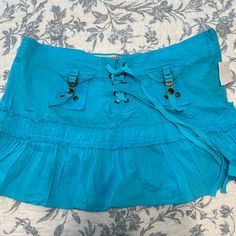 Gorgeous Blue Mini Skirt With Hardware Detailing Love. #Y2k #Zara Y2k Blue Skirt With Pockets, Y2k Blue Cotton Mini Skirt, Y2k Blue Mini Skirt, Y2k Style Blue Mini Skirt, Fitted Blue Y2k Skirt, Fitted Blue Skirt Y2k Style, Fitted Y2k Blue Skirt, Blue Cotton Mini Skirt For Beach, Trendy Blue Mini Skirt For Beach