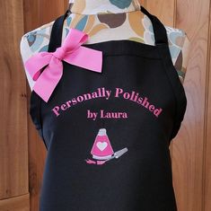 an apron with a pink bow on it that says personally polisheded by lauren