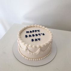 a birthday cake with the words happy birthday written on it