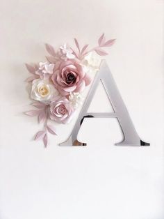 the letters are made out of paper flowers