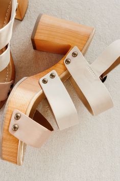 Make a statement this summer! This sandal features a wooden block heel, various colored straps, brass buckle, and comes in a neutral color. Pair our "BottleRock Platform Heel" with your favorite white dress for a classic summer look! Summer Look