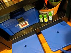 two blue trays sitting on top of a counter