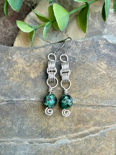 Nickel-free Green Chrysocolla Jewelry, Earthy Green Wire Wrapped Jewelry, Unique Green Wire Wrapped Earrings, Earthy Green Drop Earrings, Nature-inspired Sterling Silver Wire Wrapped Earrings, Nature-inspired Wire Wrapped Sterling Silver Earrings, Green Spiral Earrings As Gift, Stacked Earrings, Earring Designs