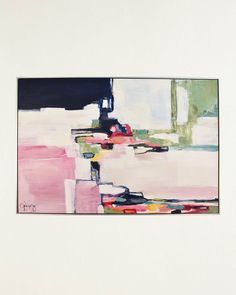 a painting hanging on the wall in front of a white wall with black and pink accents