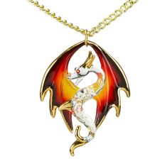 Dragon Necklace See how glass turns into an exciting dragon necklace, ready to amaze and inspire. Handcrafted Dragon Pendant: This pendant is carefully made by hand, featuring the detailed design of a majestic dragon. 18" Gold Plated Chain: It hangs from an 18-inch chain plated with gold, adding durability and a luxurious shine to your necklace. Decorated with Genuine Crystals, Real 22k Gold, and airbrushing: The pendant sparkles with genuine crystals, real 22k gold, and delicate airbrushing, cr Gold Fantasy Necklace With Dragon Design, Gold Fantasy Dragon Necklace, Gold Fantasy Jewelry With Dragon Design, Collectible Fantasy Jewelry With Dragon Design, Fantasy Gold Jewelry With Dragon Design, Fantasy Metal Necklaces For Collectors, Fantasy Dragon Design Jewelry For Collectors, Fantasy Dragon Design Necklace, Unique Dragon Design Necklace Collectible