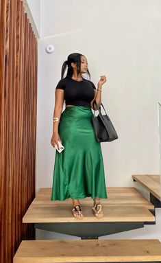 #skirts #skirt #green #black #slipper #handbags Satin Skirt Plus Size, Long Silk Skirt Outfit, Style Satin Skirt, Nude Heels Outfit, Fashionable Business Attire, Green Skirt Outfits, Silk Skirt Outfit, Simple Dress Styles, Long Silk Skirt