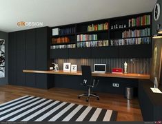 a home office with bookshelves and desk