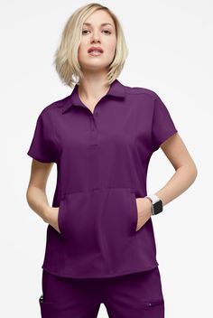 It’s a bit of a departure, but we love this scrub top. The polo collar and 3-snap placket give it a polished look, while the oversized fit and dolman sleeves make it so comfortable. The Easy Stretch by Butter-Soft™ Collection is designed with a modern look and fit. Luxurious stretch fabric keeps you comfortable all shift long, never needs ironing. • Oversized fit • Polo collar • Front snap placket • Total of 3 pockets • 2 roomy onseam front pockets • 1 mesh pocket inside right pocket • Short dol Med Couture Scrubs, Yoga Scrub Pants, Carhartt Scrubs, Healing Hands Scrubs, Leg Scrub, Koi Scrubs, Scrub Style, Top Polo, Greys Anatomy Scrubs