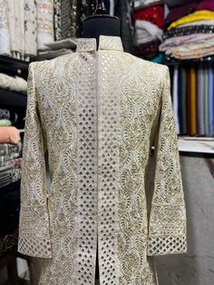 * 3 Piece Ivory :-Kurta, Pant  and Sherwani  *Fabric: %100 Silk  , Thick, Warm, Comfortable, Breathable, Softer, Satin Feeling *Center Hide Button Sherwani  With Zipper Fly Pants *This Suit Has A 6" Drop Which Is The Difference Between The Size Of The Sherwani & Pants. For Example, A 40r Jacket Includes A 34W Pant *Dry Clean Only Important Note: All Our Products Are Made To Order ! Please Contact Us For Perfect Fitting Suit. .Full Lining  Sherwani With Padding *We are proud to offer a wide range Unstitched Beige Sherwani With Naqshi Detailing, Beige Raw Silk Sherwani With Dabka, Beige Sherwani With Resham Embroidery For Transitional Season, Fitted Raw Silk Sherwani With Naqshi Details, Fitted Raw Silk Sherwani With Naqshi, Wedding Kurta With Zari Work For Eid, Ceremonial Off White Sets With Chikankari Embroidery, Traditional Off White Sherwani With Intricate Embroidery, Traditional Off-white Sherwani With Intricate Embroidery