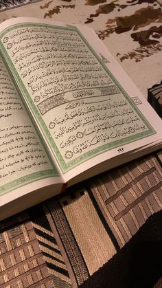 an open book sitting on top of a table