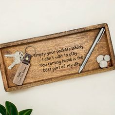 a wooden sign with keys and keychain on it that says, try your pockets today i can't wait to play the you coming home is the best part of my day