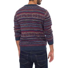 Fernando Cano presents this precisely handsome men's sweater from Peru, envoloped in knitted motifs. Working in luxurious alpaca wool, he creates a design of intricate geometry in shades of blue, grey and purple with deep red accents. 100% alpaca Dry cleaning recommended Textile softness: Soft -- this item has been made with natural fibers that are soft to the touch Handmade in & fairly traded from Peru Casual Merino Wool Sweater With Fair Isle Pattern, Blue Alpaca Long Sleeve Sweater, Blue Long Sleeve Alpaca Sweater, Fall Blue Alpaca Sweater, Blue Wool Knit Sweater, Blue Wool Sweater With Fair Isle Pattern, Colca Canyon, Paw Print Jewelry, Spirit Clothing