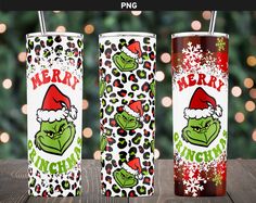 two christmas themed tumblers with the grin on them