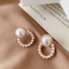 Pearl White Pearl Earrings With Elegant Design, Pearl White Round Earrings For Party, Bridal Pearl Earrings With Pearl Chain, Bridal Pearl Chain Earrings, Round Pearl Chain Earrings For Party, Pearl Chain Earrings For Party, Round Pearl Drop Earrings For Party, Party Pearl Chain Round Earrings, Pearl White Pearl Drop Clip-on Earrings