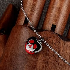 Just a touch of evil. Sculpted out of sterling silver, this pendant features a insidious poison apple. Deep red color contrasts polished black rhodium in a fiendish skull drip pattern. Immortalize the iconic moment in which the queen dips the blood red apple into the potion in her cauldron. Now, go ahead, make a wish and take a bite!Weight: 5.7 gMaterial: 925 SilverPlating Color: BlackLength: 440 mm Touch Of Evil, Drip Pattern, Poison Apple, Poison Apples, Deep Red Color, Blood Red, Black Rhodium, Necklace Online, Red Apple